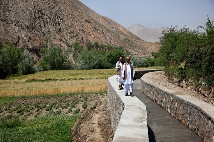 Two village community development councils in Panjshir, Afghanistan voted to build this canal, benefiting farmers on both sides. Graham Crouch/World Bank